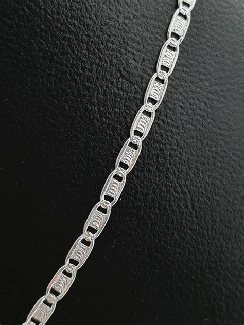 cadena de plata tipo gucci